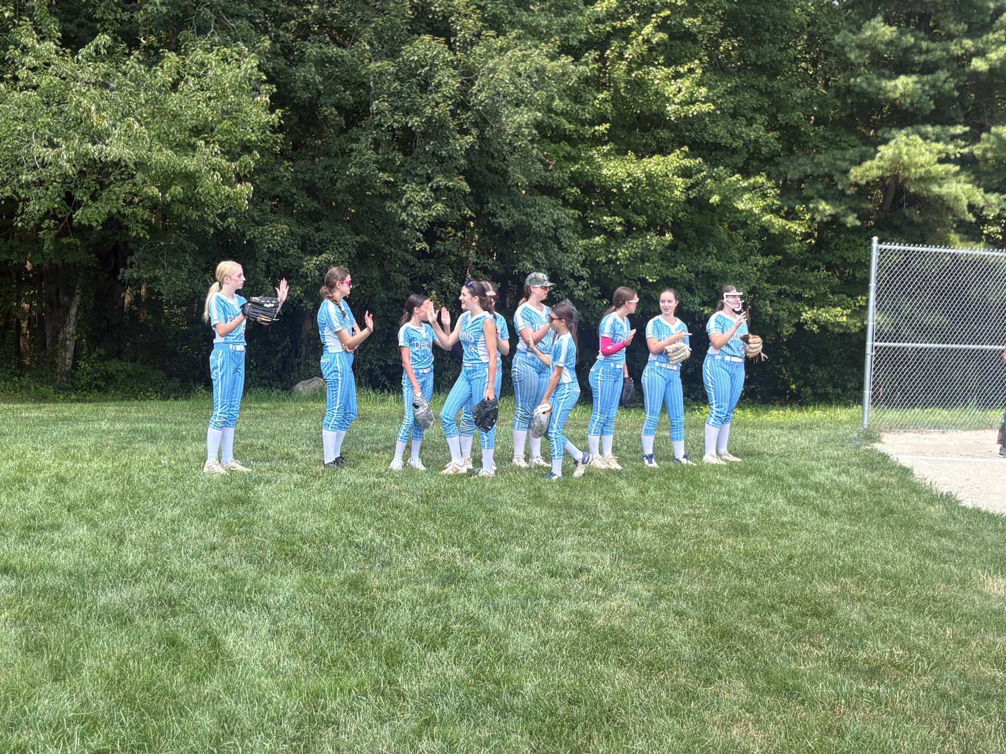 Metrowest Devils teammates together on the field